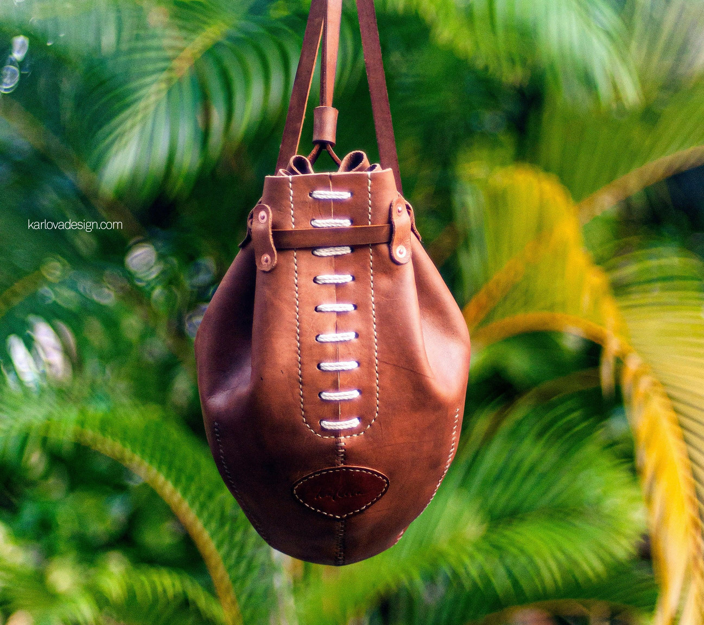 Leather rugby, football, boxing bag style laced backpack leather craft DIY PDF pattern by Karlova Design, leatherwork template for hand stitching