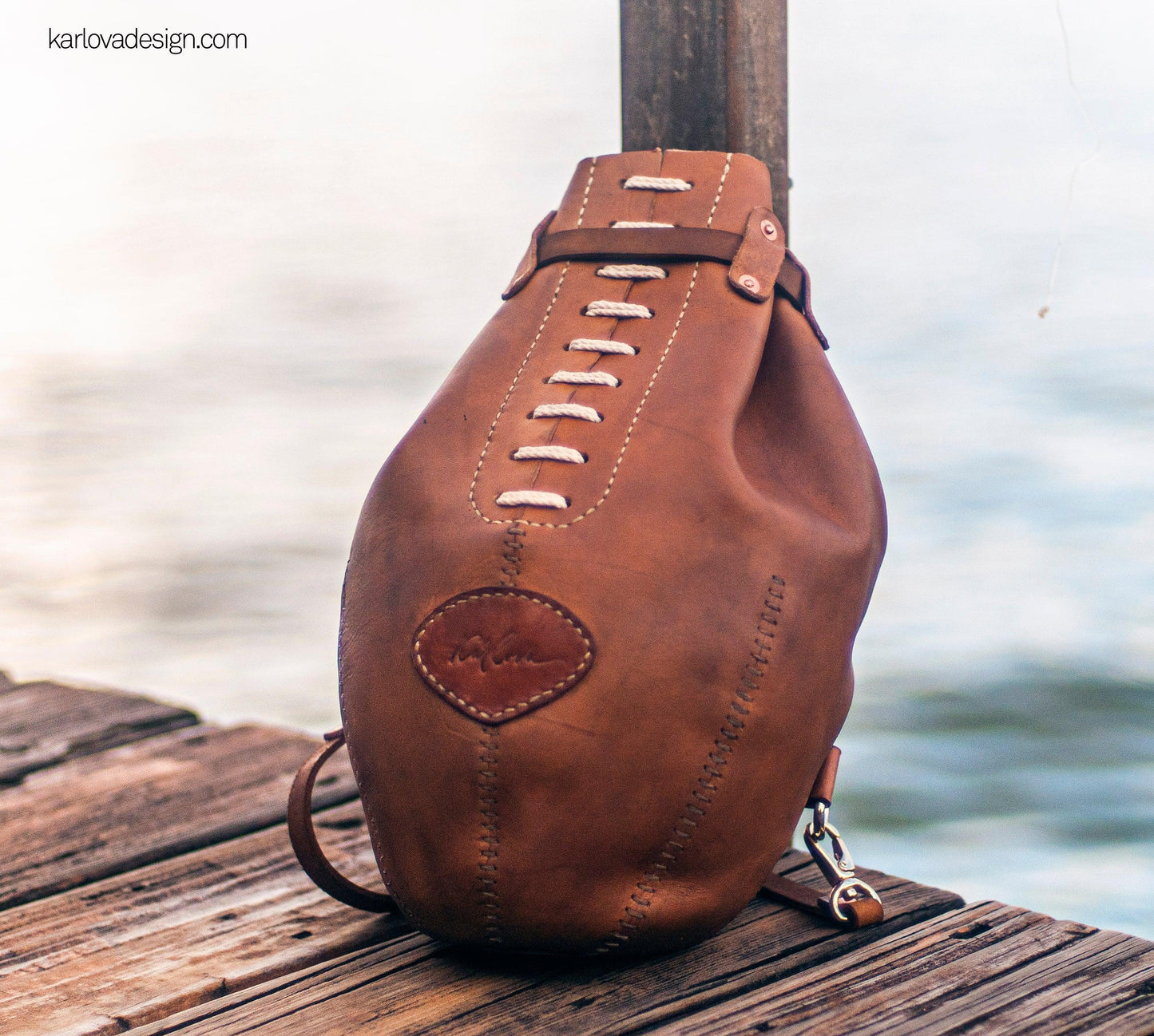 Leather rugby, football, boxing bag style laced backpack leather craft DIY PDF pattern by Karlova Design, leatherwork template for hand stitching