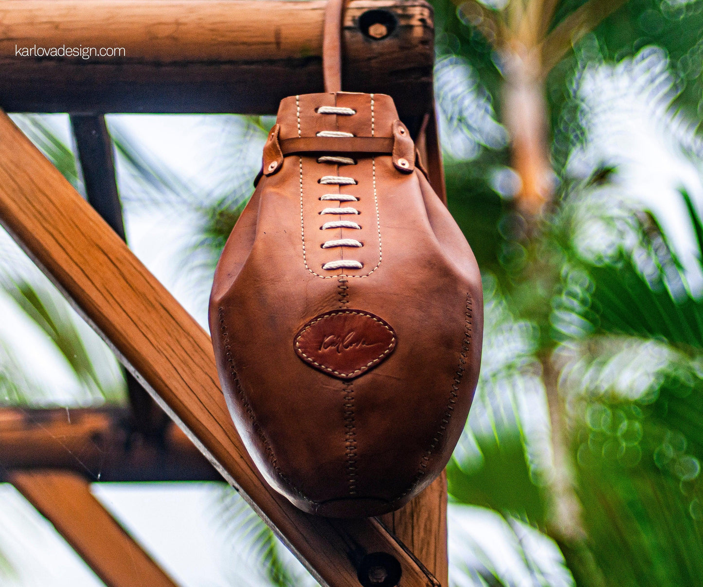 Leather rugby, football, boxing bag style laced backpack leather craft DIY PDF pattern by Karlova Design, leatherwork template for hand stitching