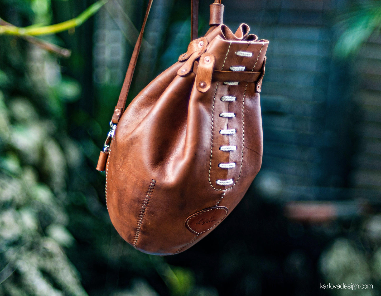 Leather rugby, football, boxing bag style laced backpack leather craft DIY PDF pattern by Karlova Design, leatherwork template for hand stitching